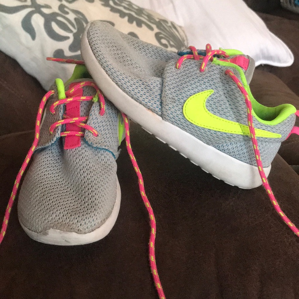 Little girl pink, gray, and lime green Nike shoes